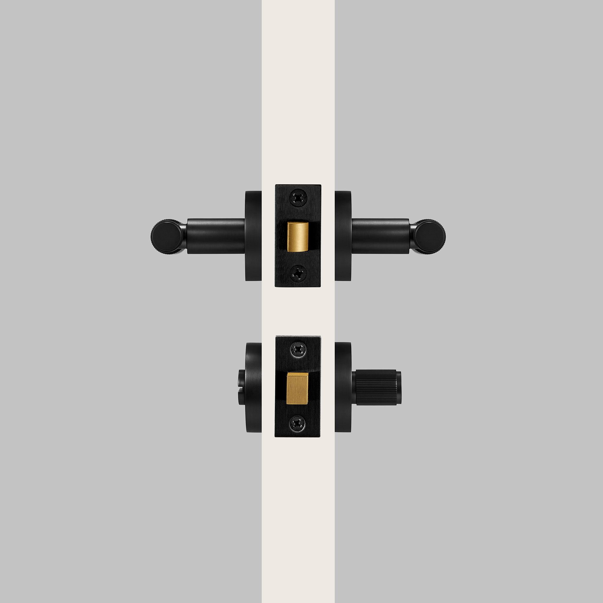 Låsvred 308A-BK-248 | Räfflad | Matt Svart/Mässing - Dooroom